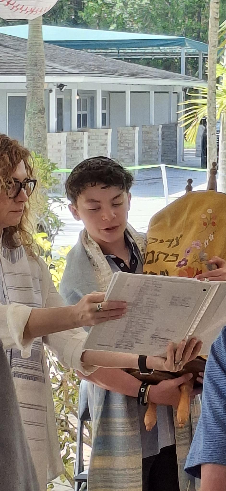 Student holding the Torah